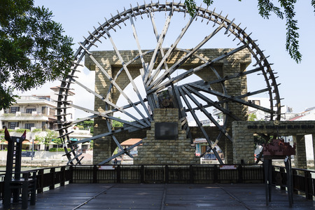 The replica of Melaka Malay Sultanate Water Wheel near the Melaka River, Melaka, Malaysia.のeditorial素材