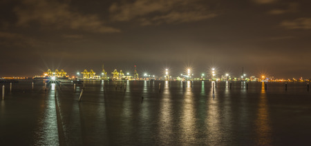Night view of port cargo container terminal in Butterworth, Penang, Malaysia.のeditorial素材