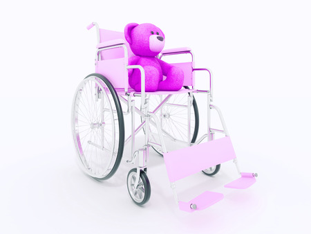 child handicap concept: brown teddy bear in wheelchairの写真素材