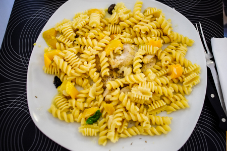 Fusilli type italian pasta with mushrooms. Traditional culture Italy dishの写真素材