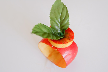 Fake fruit smartwatch with red apple. Studio shotの写真素材