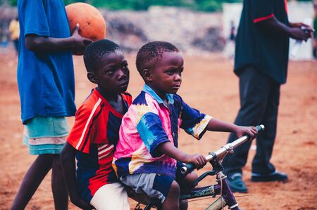 Mali, Africa - Black african children playing soccer in a rubbish dump. Rural area near Bamakoのeditorial素材