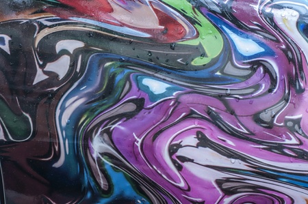 A wet and colorful abstract grafitti mural.の素材