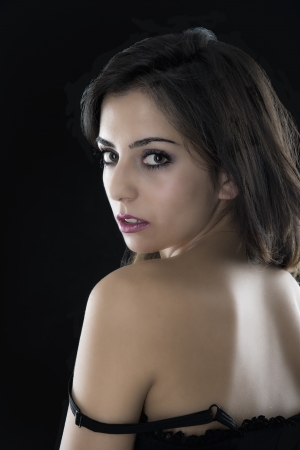 young caucasian girl isolated on black backgroundの写真素材