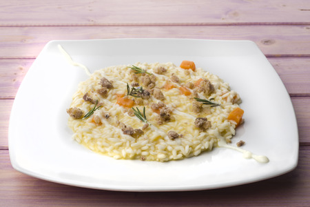 italian risotto with pumpkin and sausageの写真素材