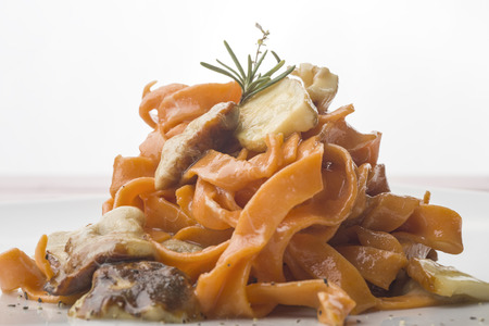 italian fettuccine with tomato and porcini mushroomsの写真素材