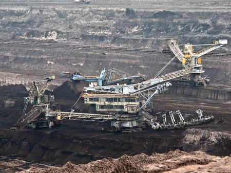 a brown coal mine with a bucket-wheel excavator