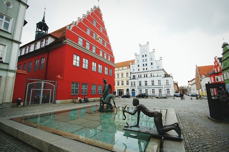 Greifswald, Mecklenburg-Vorpommer/ Germany March 14 2009:  cityscape of Greifswald with its typical hanseatic houses at market place.のeditorial素材