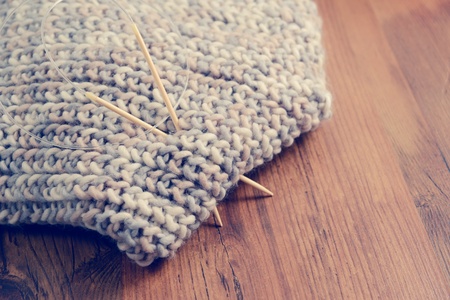 knitting a scarf. vintage filter.