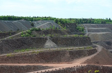 aerial view over a quarry hole. mining industry.