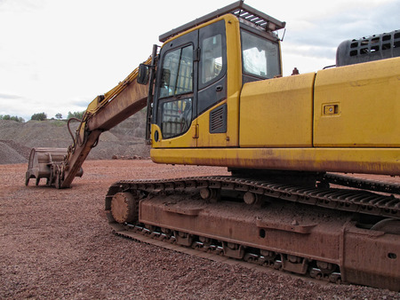 earth mover in a Porphyry rock quarry. mining industry