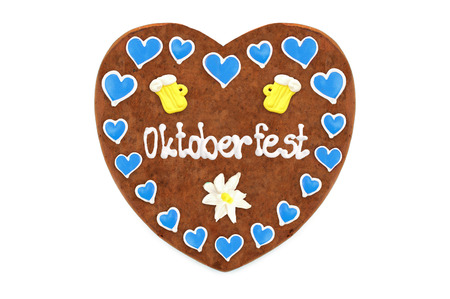 Oktoberfest Gingerbread heart (engl. October festival Munich) with white isolated background (Germany).の写真素材