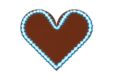 Embroidered gingerbread heart with copyspaceの写真素材