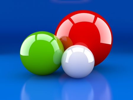Multi coloured sphere of the different size on a colour backgroundの写真素材