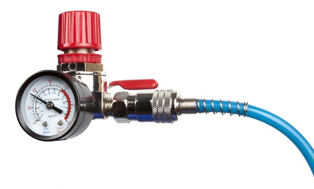 Regulator of pressure of air with a manometre isolated on a white backgroundの写真素材