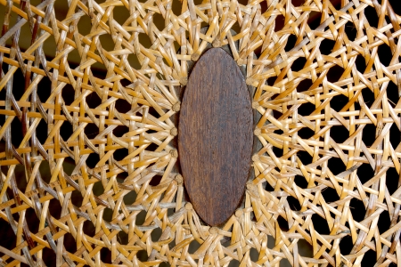 closeup abstract of patterns and textures on wicker weave on chairの写真素材
