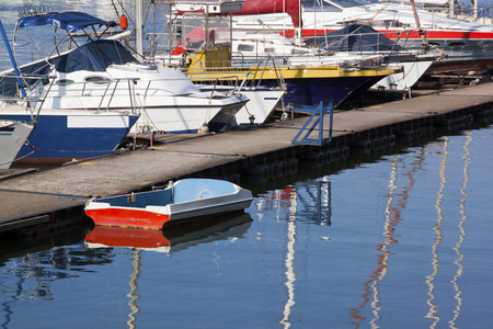 Yachts moored at jetty at yacht mole in harbor in Durban South Africa