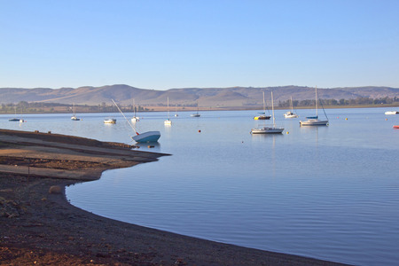 Early morning view of boat slipway on Midmar dam against Yachts anchored in water at Howick, Kwa-Zulu Natal, South Africaのeditorial素材