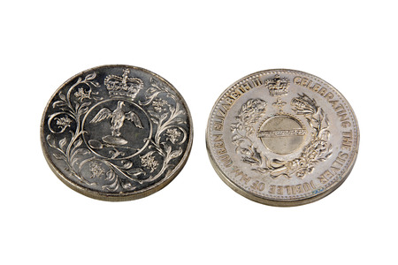DURBAN, SOUTH AFRICA -  NOVEMBER 18, 2014:Two vintage souvenier medals issued to commemorate Queen Elizabeth II silver jubilee from 1952 to 1977のeditorial素材