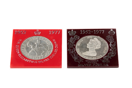 DURBAN, SOUTH AFRICA -  NOVEMBER 18, 2014:Two vintage souvenier medals issued to commemorate Queen Elizabeth II silver jubilee from 1952 to 1977のeditorial素材