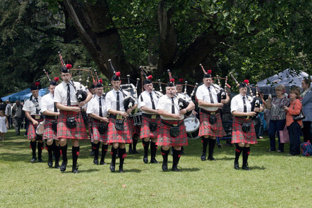 Richmond, KwaZulu Natal, South Africa - December 7, 2014: Pietermaritzburg Scottish Caledonian pipe band perform at Natal Vintage Tractor and Machinary Club at Baynesfield Estate in Richmond, KwaZulu-Natal, South Africaのeditorial素材