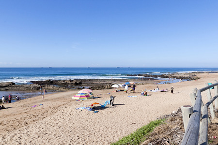 DURBAN, SOUTH AFRICA - MAY 3, 2015: Many unknown people on Umdloti beach in Durban, South Africaのeditorial素材