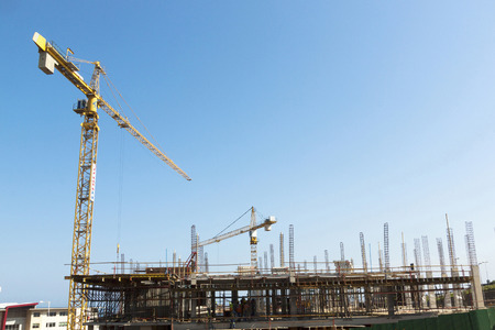 MHLANGA RIDGE, DURBAN, SOUTH AFRICA - OCTOBER 21, 2016: High lift crane and many unknown people...