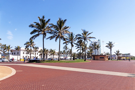 Quiet morning red paved promenade on Golden Mile Beachfront landscape in Durban South Africaの写真素材