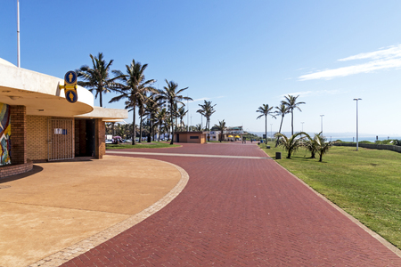 Quiet morning red paved promenade on Golden Mile Beachfront landscape in Durban South Africaの写真素材