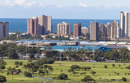 DURBAN, SOUTH AFRICA - APRIL 16. 2017: Above view of Royal Durban Golf Course and Greyville race track against city and coastal skyline in Durban, South Africaのeditorial素材