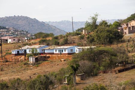 Huts and housing all painted blue inidentifying formal homestead