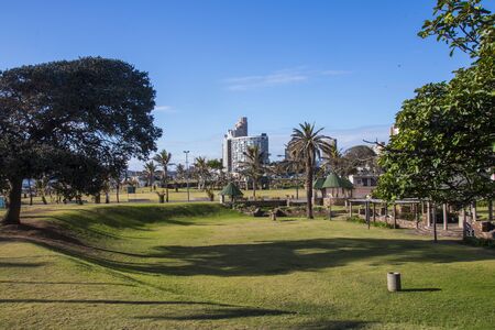 Sunken grassy area in front of hotels on durban's golden mileの写真素材