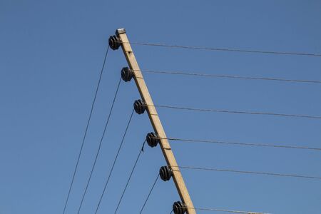 Pulleys wire strands and metal components forming electric security fence