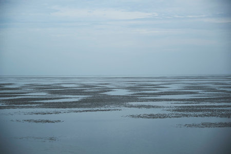 Shallow waters of a offshore sandy platform leading to the open sea.の写真素材