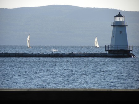 Lighthouse sailboatsの写真素材