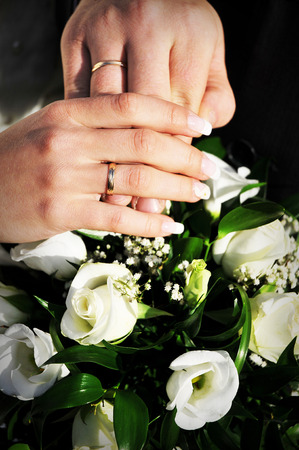 wedding rings on the hands of the newlyweds, wedding dayの写真素材