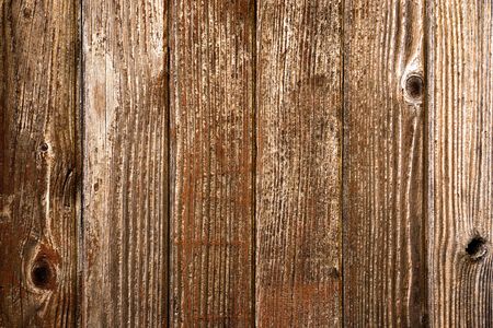 the brown wood texture of a door with natural patternsの写真素材