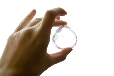 hand holding a gem, concept of examination of the jewelの写真素材
