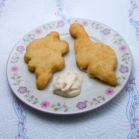 fried chicken pieces on a plate served with mayonnaiseの写真素材