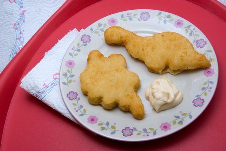 fried chicken pieces on a plate served with mayonnaiseの写真素材