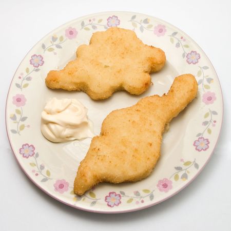 fried chicken pieces on a plate served with mayonnaiseの写真素材