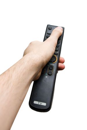 Hand holding an old TV remote control isolated over whiteの写真素材