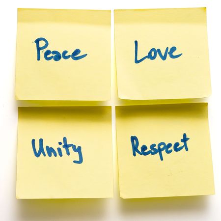 peace love unity respect yellow post-its on a board isolatedの写真素材
