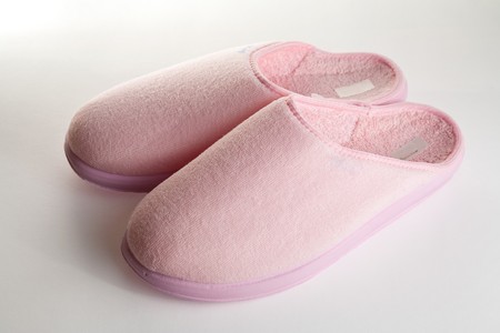 pink slippers on white background in studio (not isolated)