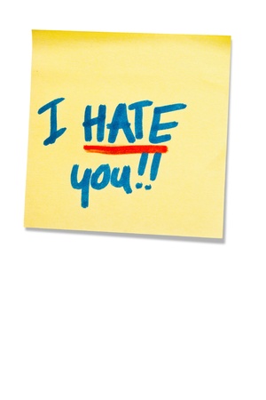 post-it note with handprinted i hate you isolated with shadowの写真素材