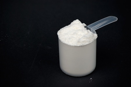 A scoop of protein powder drink (focus stacking technique)の写真素材