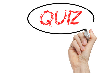 Quiz written with marker on whiteboard education conceptの写真素材