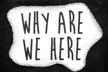 Why are we here question written on a blackboardの写真素材
