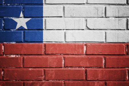 Chile flag on the brick wallの写真素材