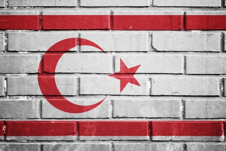 Turkish republic of northern cyprus flag on the brick wallの写真素材
